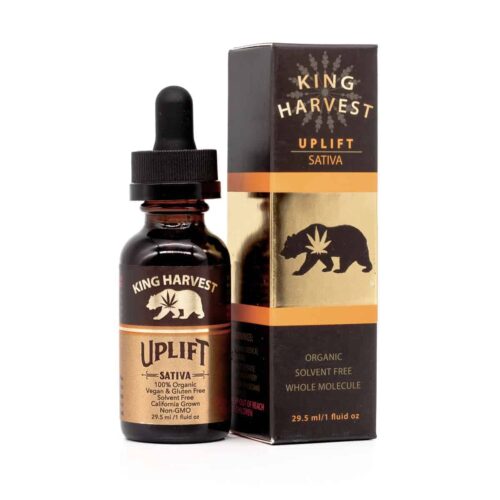 Uplift Sativa filled in a bottle beside a box